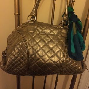 Light gold bag with for a bright sunny day outside